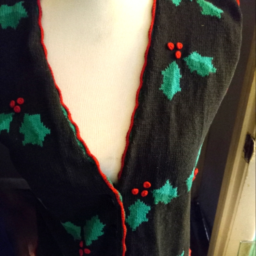 Not new,never worn black knit vest with scalloped edges embroidered hollys sizem